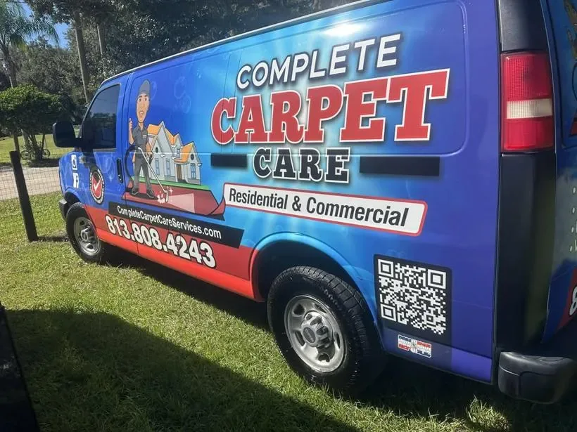 Blue Complete Carpet Care van with truck-mounted carpet cleaning equipment serving Brandon, FL, residential and commercial
