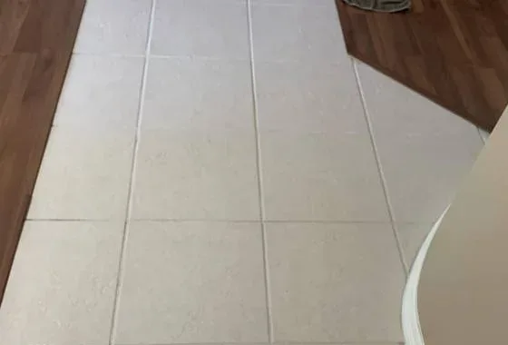 Tile floor and clean grout lines in an entryway or hallway, tile and grout cleaning by Complete Carpet Care, Plant City FL